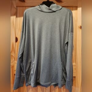 Columbia XL women's green top, wih pockets and split back detail